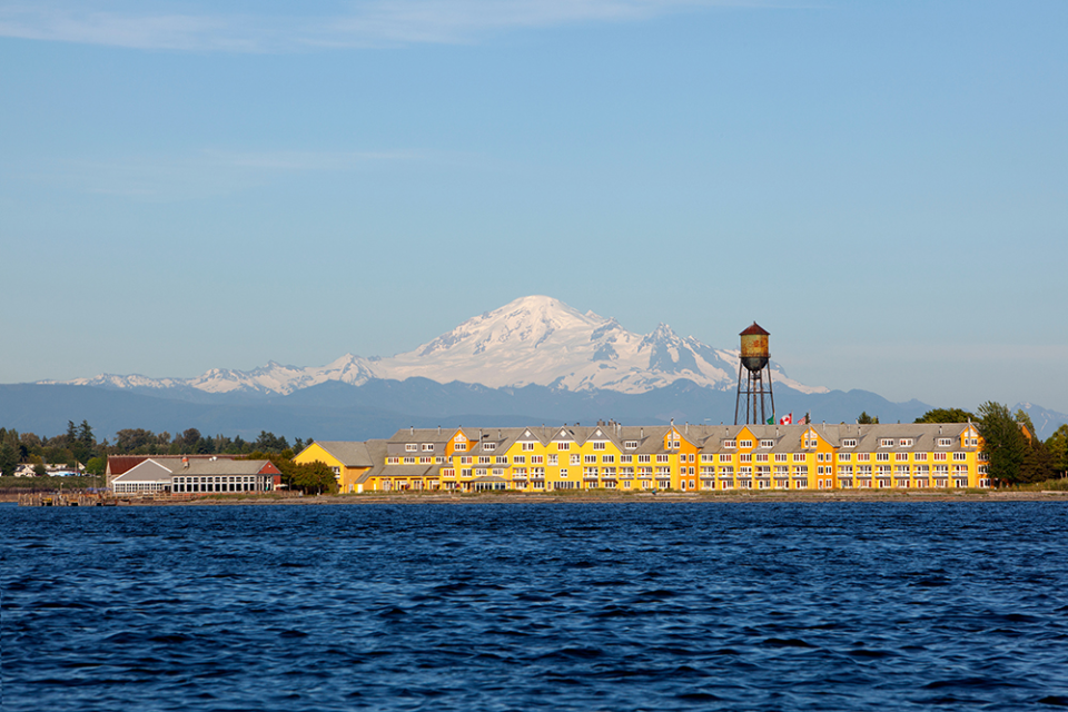 a large building next to a body of water