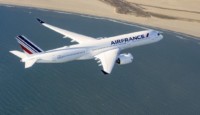 an airplane flying over the ocean