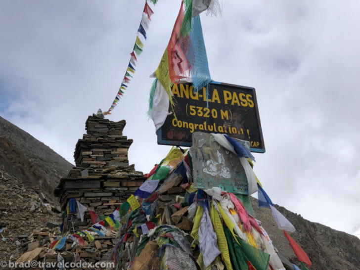 a sign on a mountain
