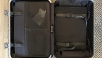 a suitcase with a mesh inside