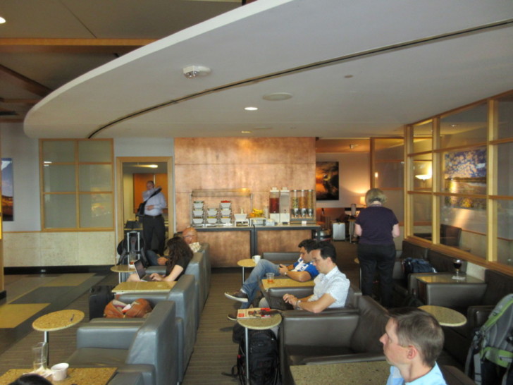a group of people sitting in a lounge