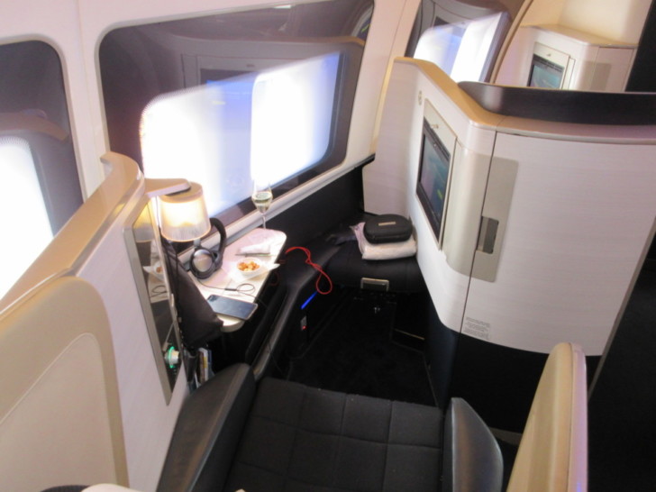 a seat and a table in a plane