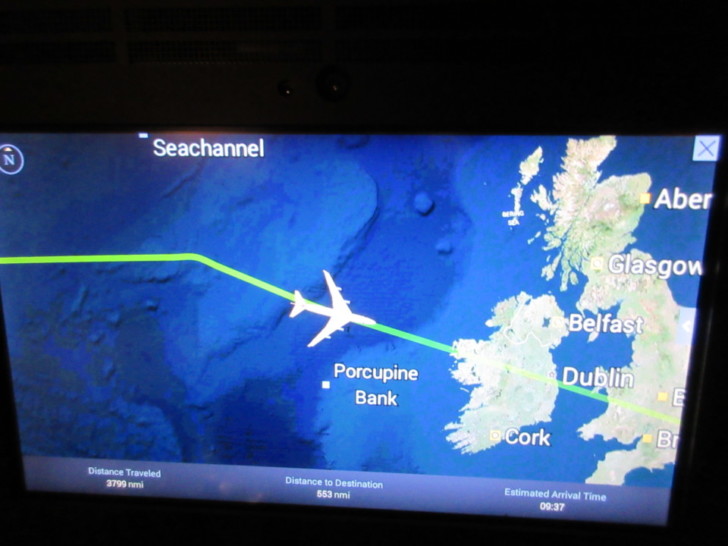 a map of the united kingdom with an airplane flying