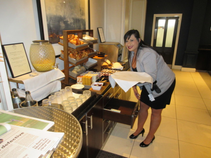 a woman standing in a restaurant