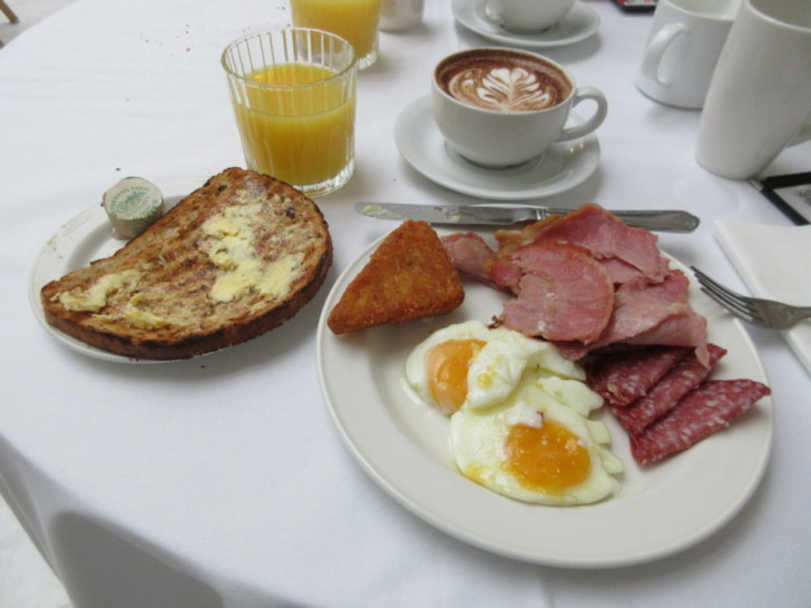 a plate of food and coffee