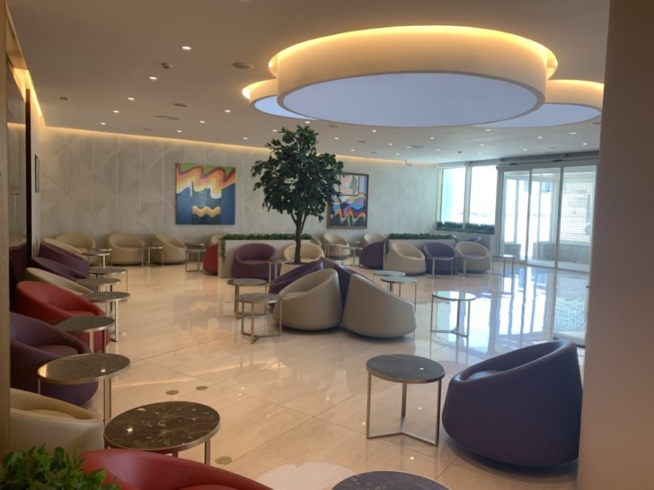 a room with chairs and tables