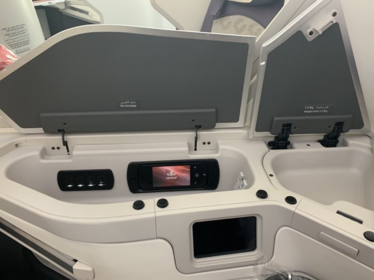a seat with a screen and a screen