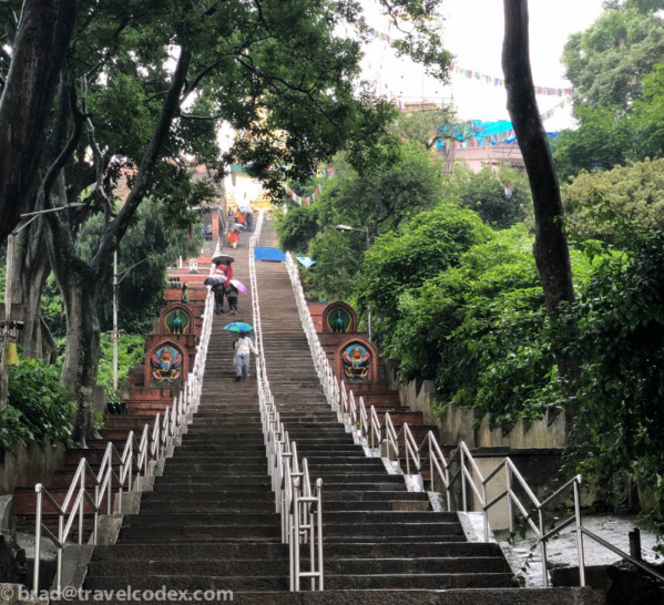 a stairs with people walking up the stairs