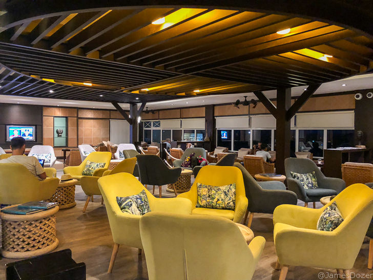 a room with chairs and tables
