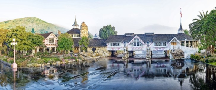 a building with a bridge over water