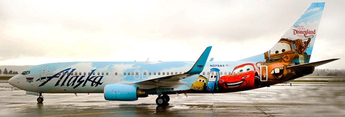 a plane with cartoon characters on the side