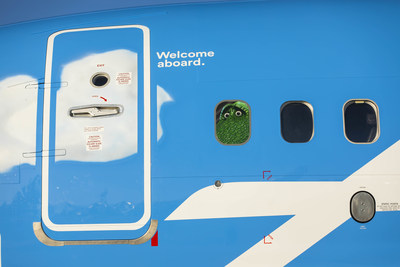 a blue airplane with a door and windows