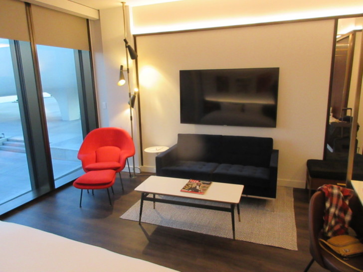 a room with a tv and a couch