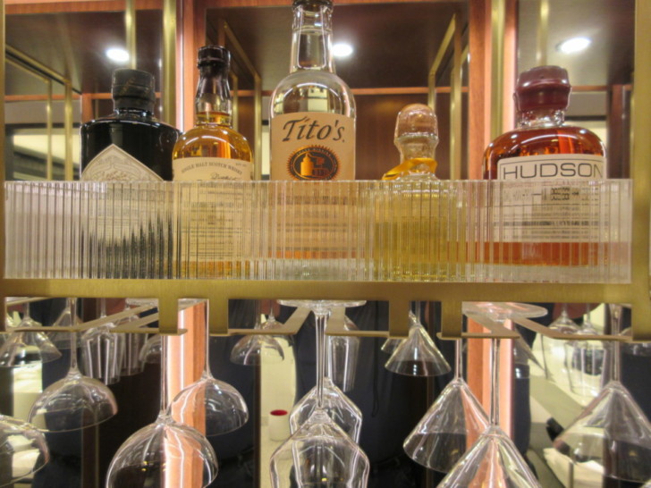 a group of bottles and glasses