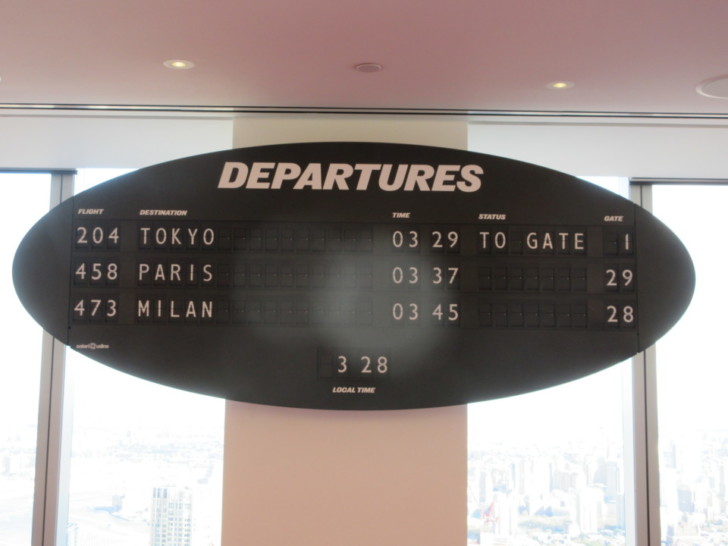 a black sign with white text