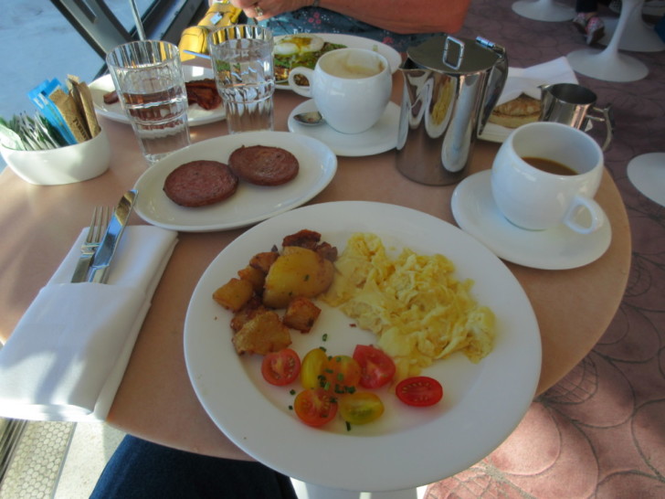 a plate of breakfast food on a table