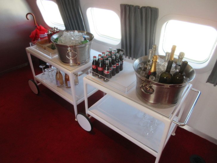 a table with drinks and bottles on it