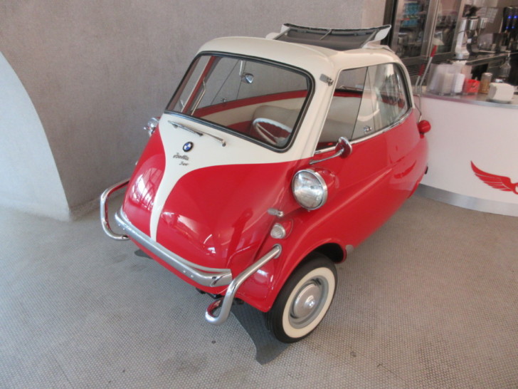 a small red and white car