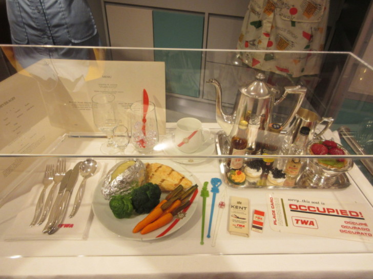 a tray with food and utensils on it