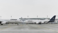 two airplanes on a runway