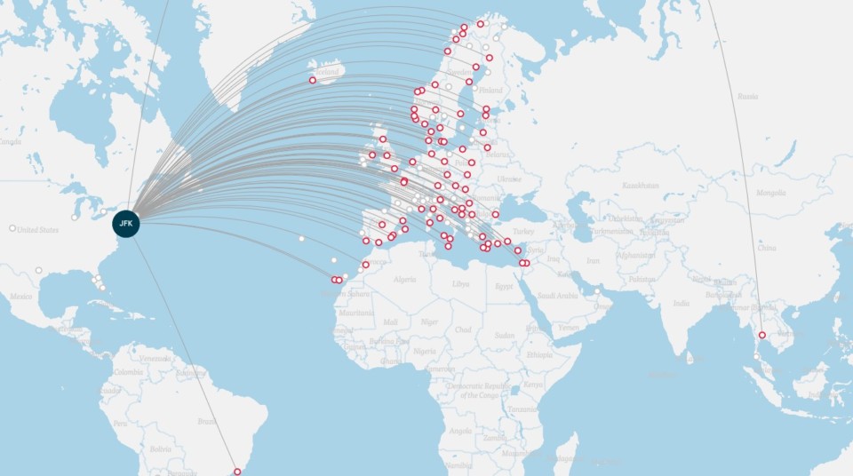 a map of the world with red dots