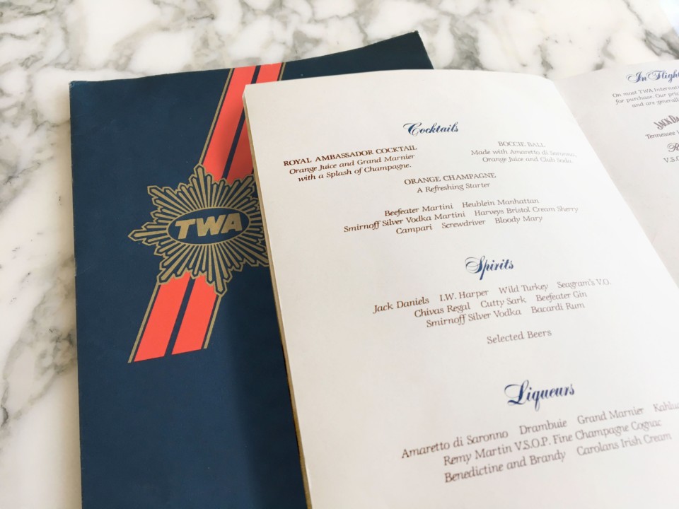a menu on a marble surface