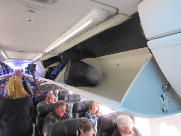 a group of people sitting on a plane
