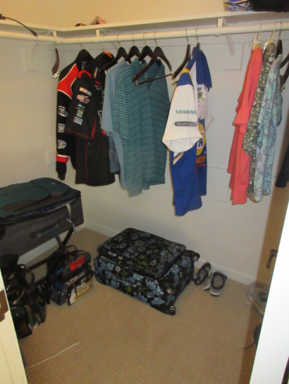 a closet with clothes from a swinger