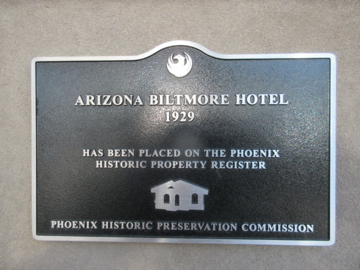 a black sign with white text