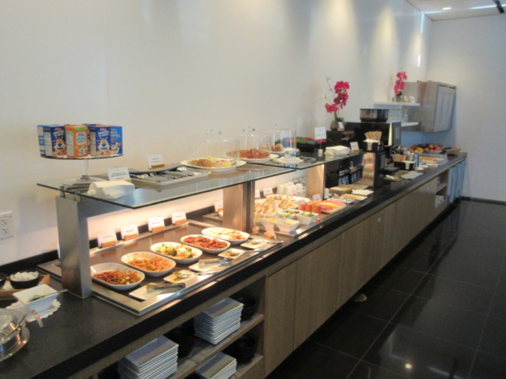 a buffet line with food on it