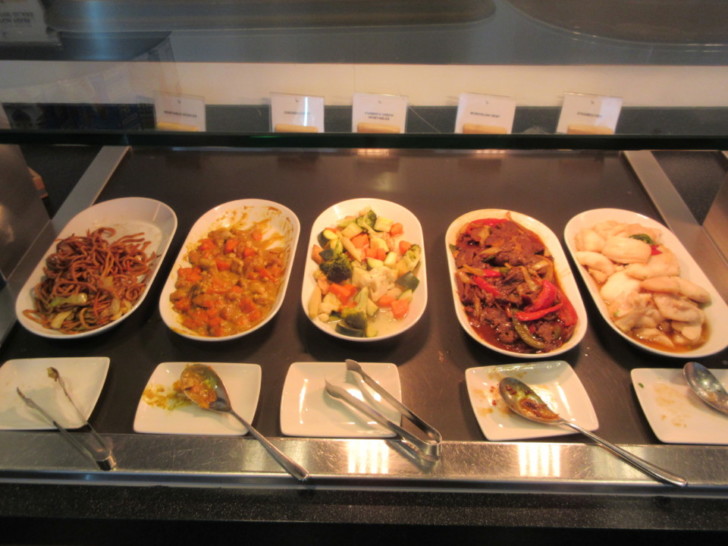 a row of plates of food