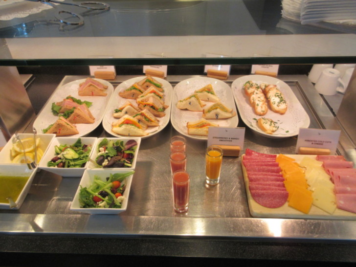 a buffet table with different food items