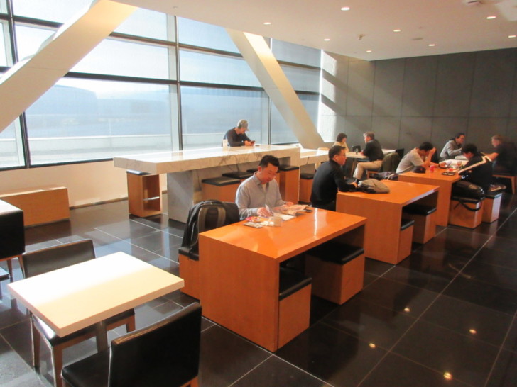 a group of people sitting at tables