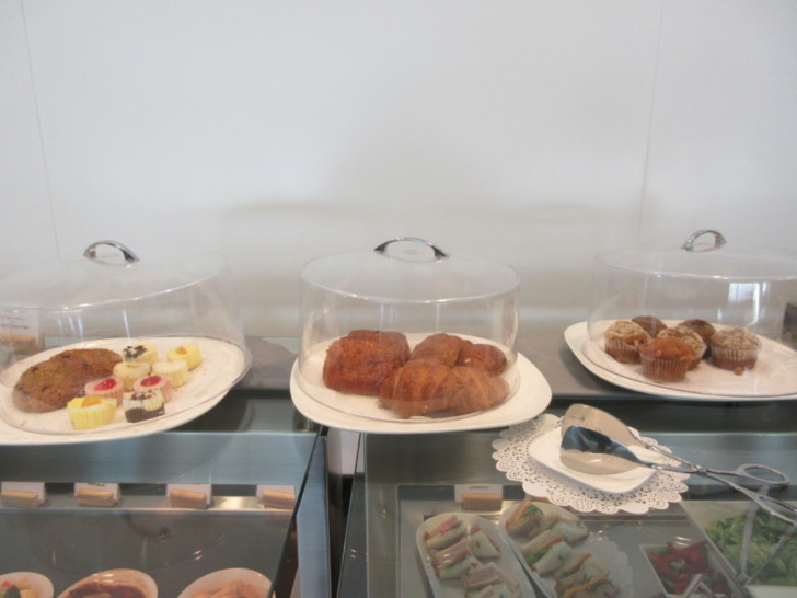 a row of pastries on plates