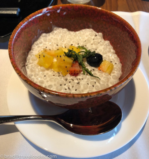 a bowl of food with a spoon