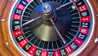 a roulette wheel with a ball on it