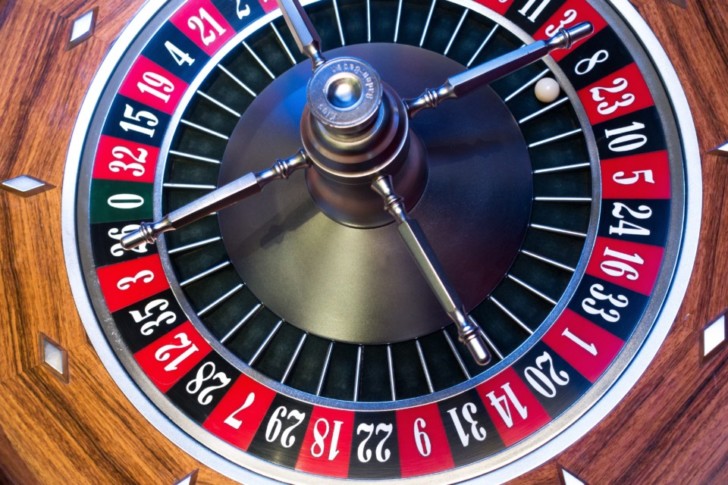 a roulette wheel with a ball in it