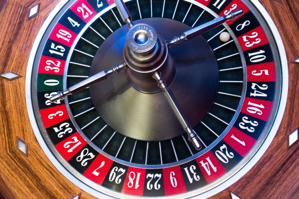 a roulette wheel with a ball on it