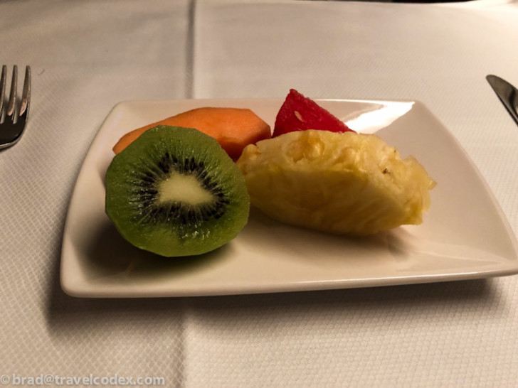 a plate of fruit on a table