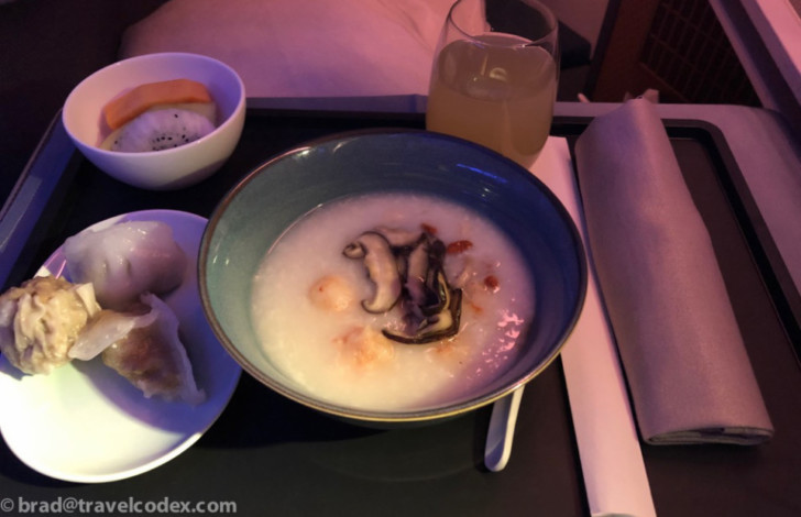 a bowl of food on a tray