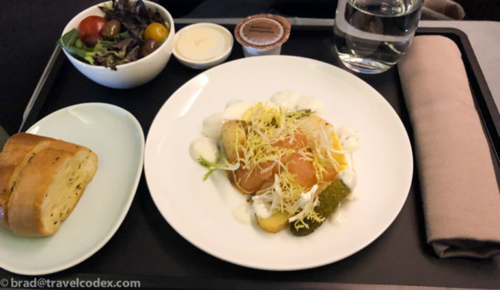 a plate of food on a tray