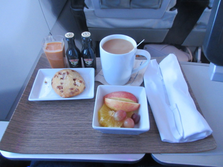 a tray of food and drinks on a table