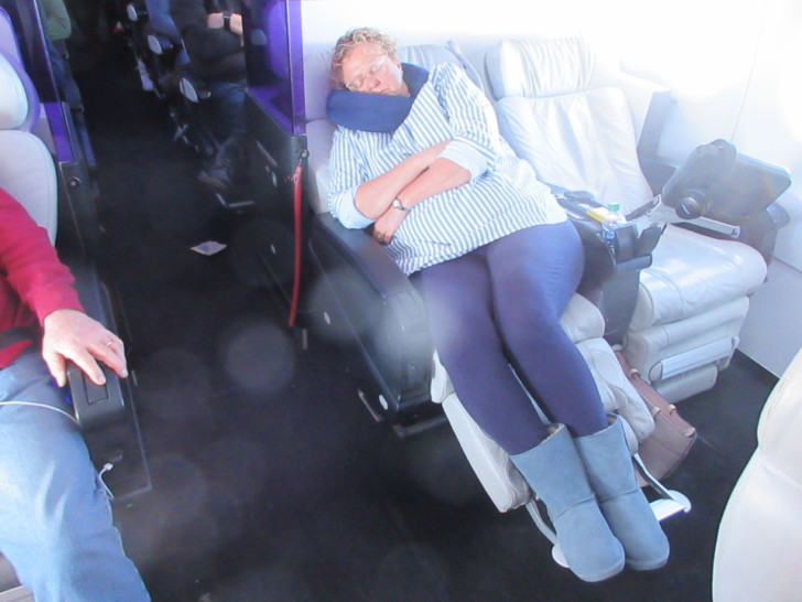 a woman sleeping in a chair