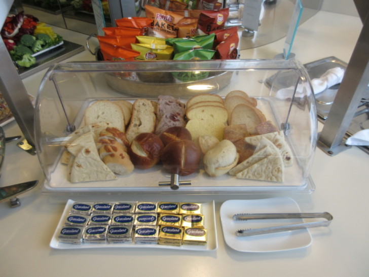 a tray of bread and snacks