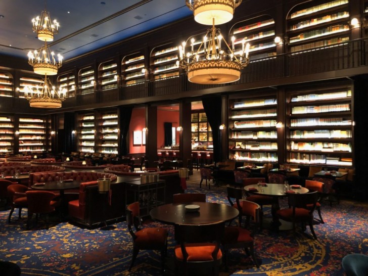 a room with tables and chairs