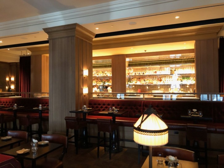 a restaurant with tables and chairs