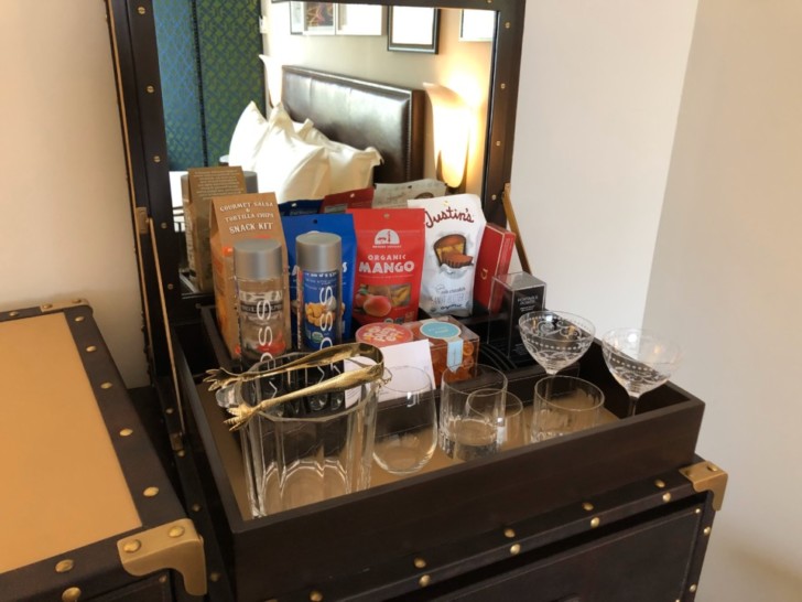 a chest of drawers with a variety of objects