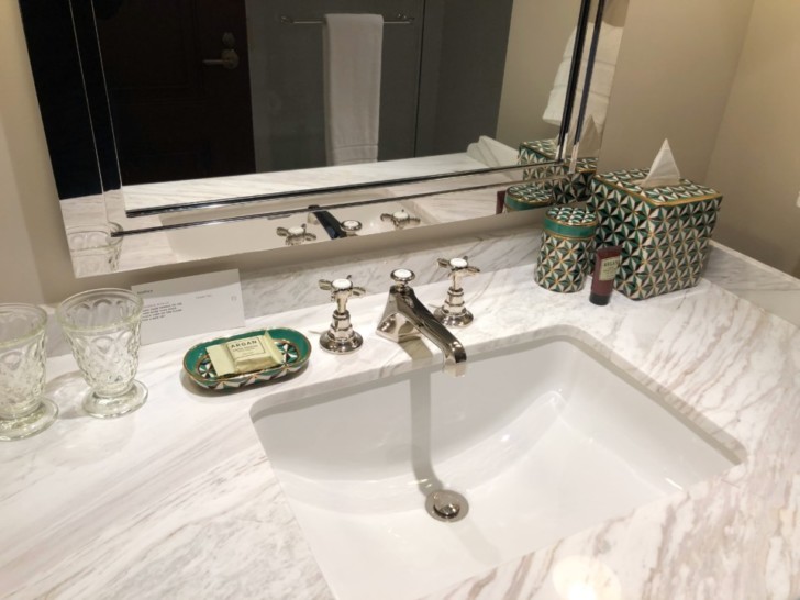 a bathroom sink with a mirror