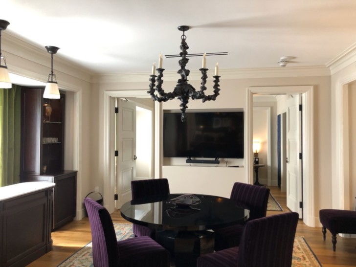a room with a table and chairs