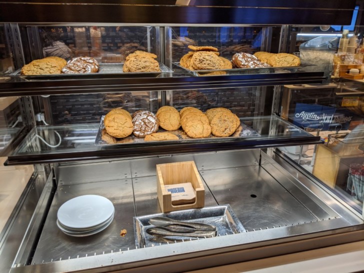 a display case with cookies on it